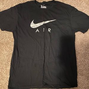 Silver Nike shirt